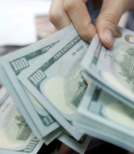 Dólar sobe e fecha perto de R$ 5,15 com aversão a risco